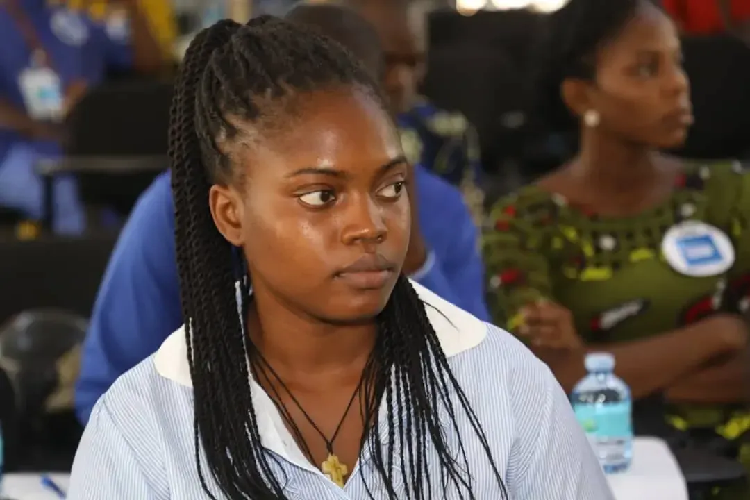 A participant listens attentively.