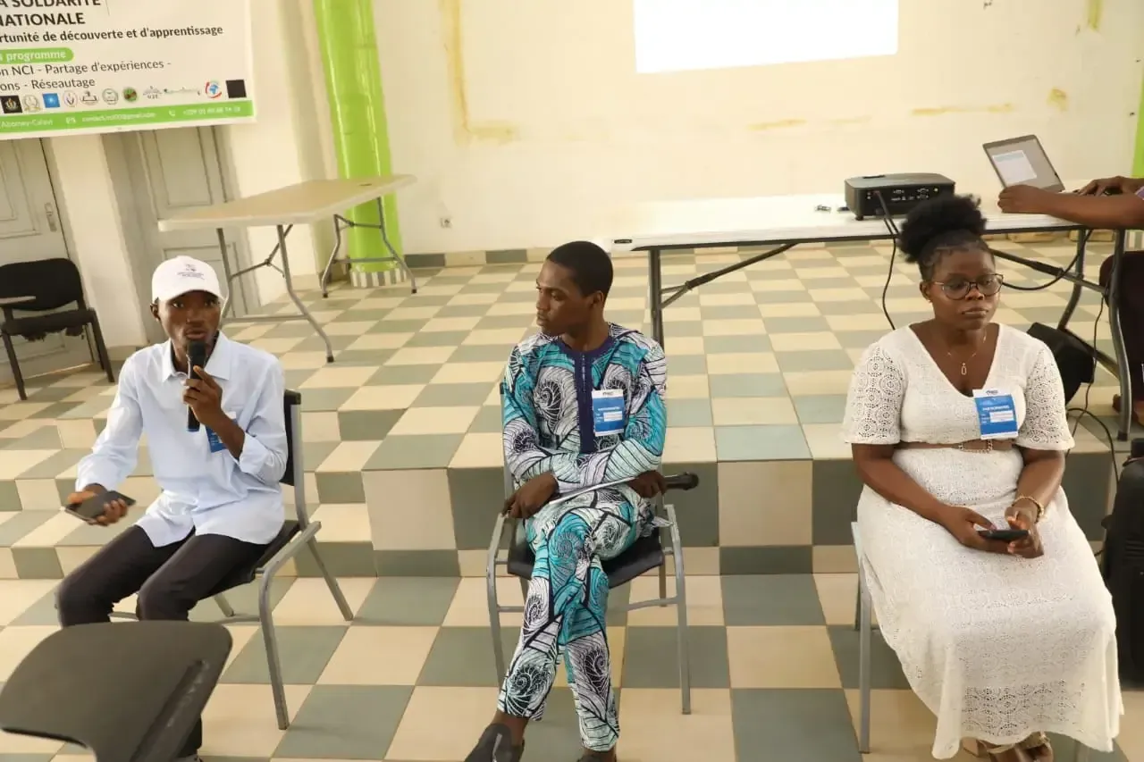 A panel discussion in front of the audience.