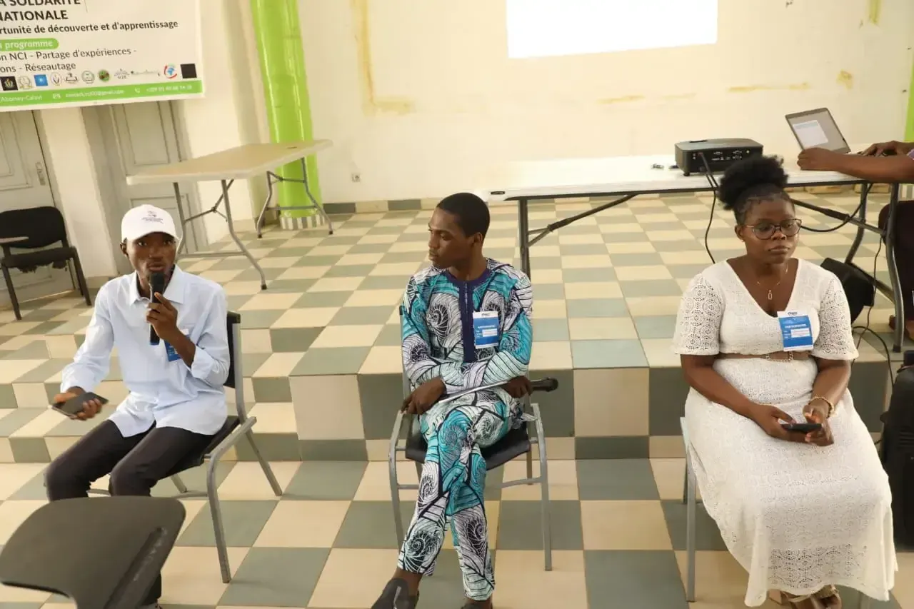 A panel discussion in front of the audience.