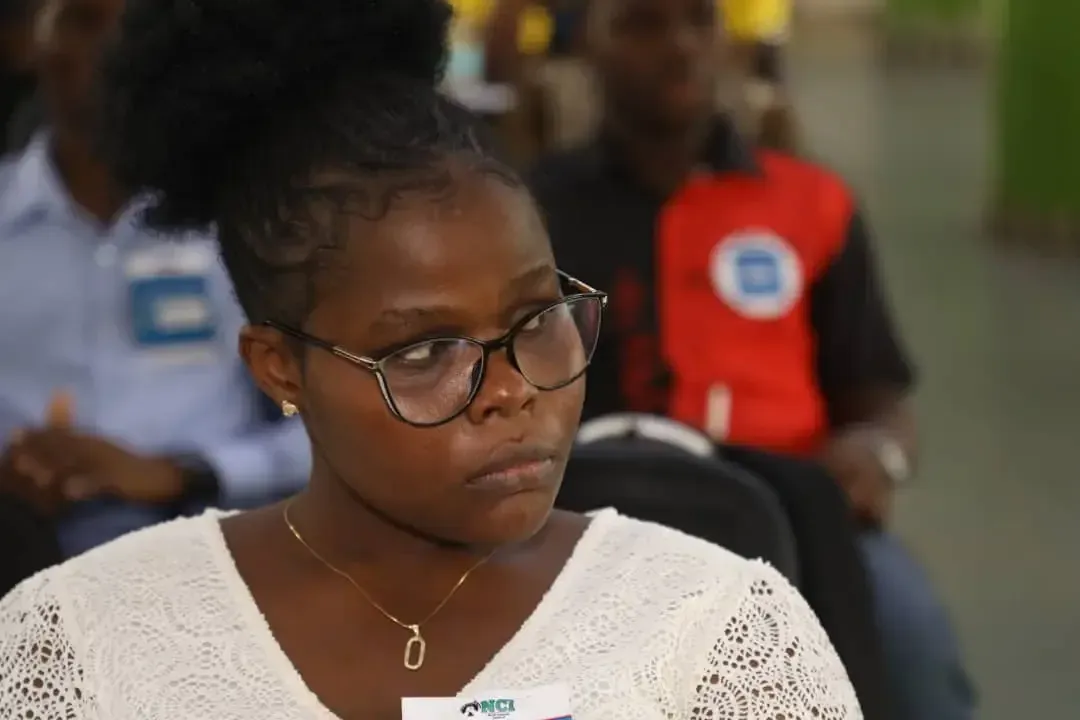 A participant concentrating during the discussions.