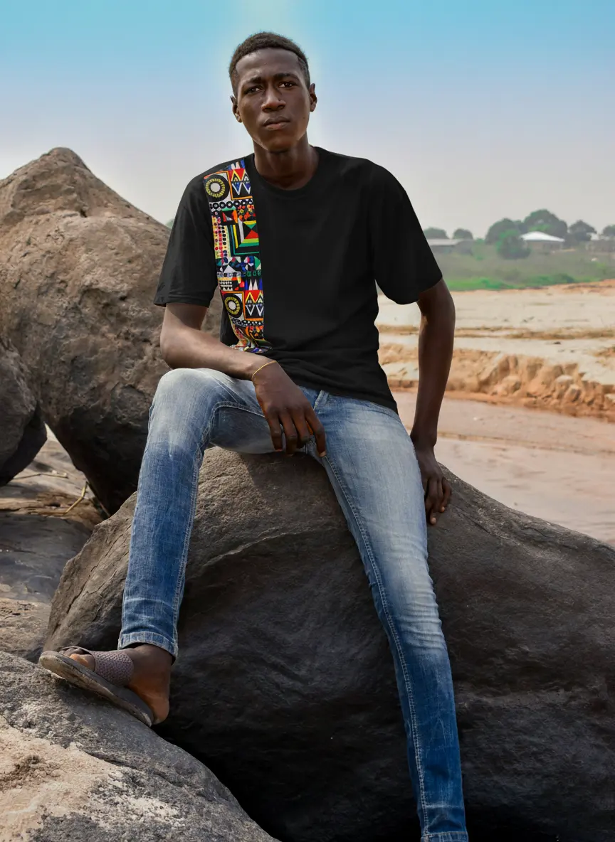 Model wearing the NCI x WOPLAH solidarity T-shirt.